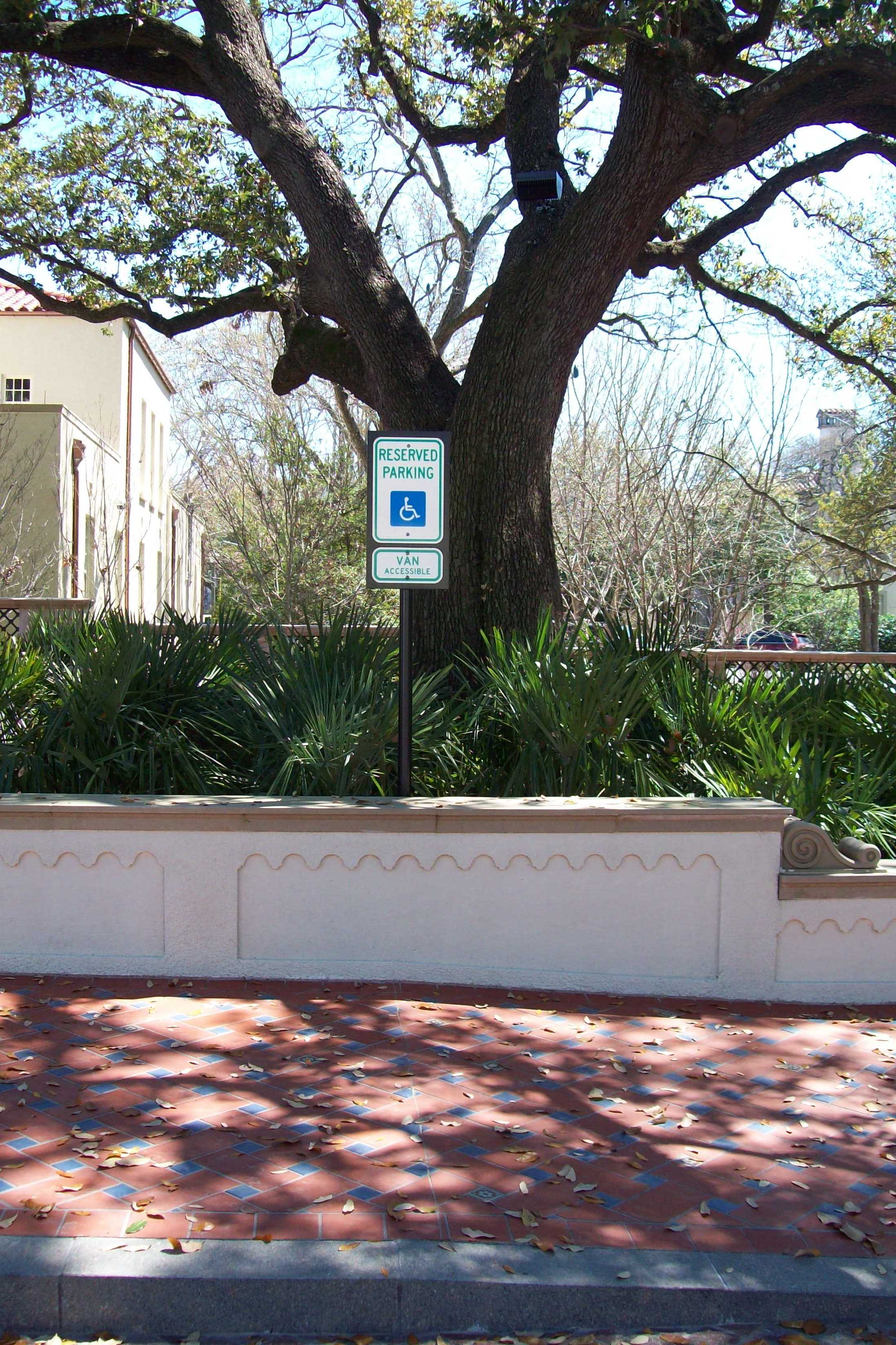 No parking in designated handicap space without proper license plate or placard.