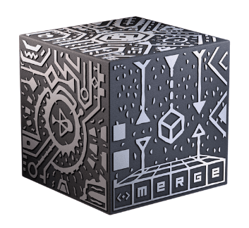 Black cube with silver writing and images 