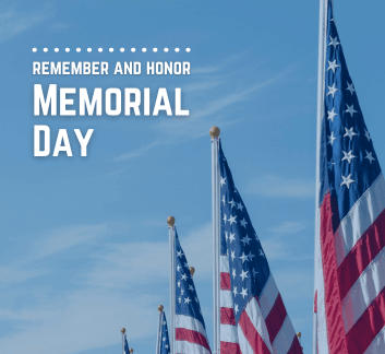 American flags with a blue sky background